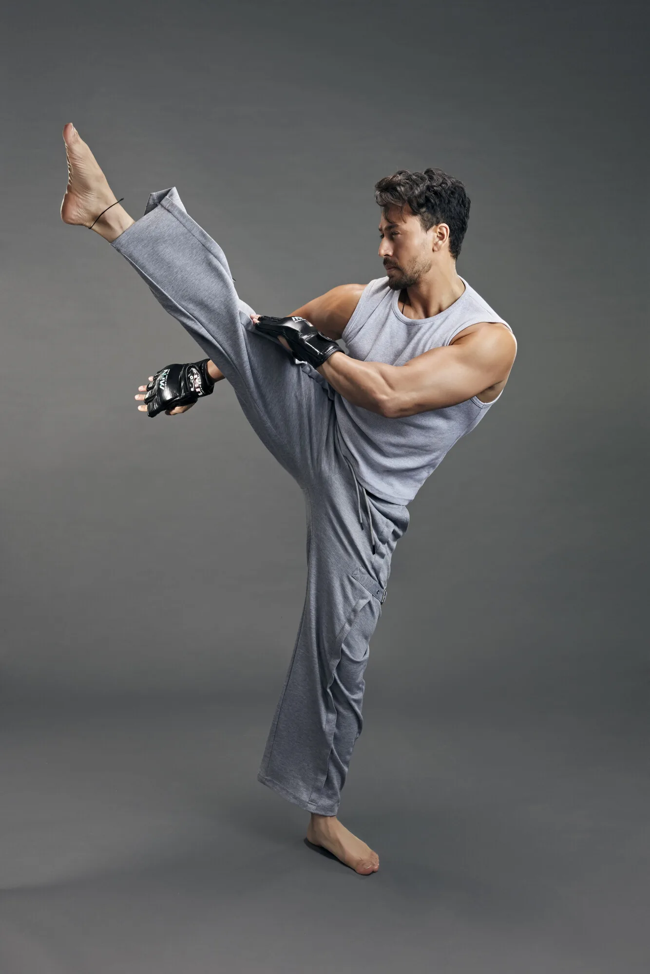 Tiger Shroff, co-founder of MMA Matrix Gym, mid high kick