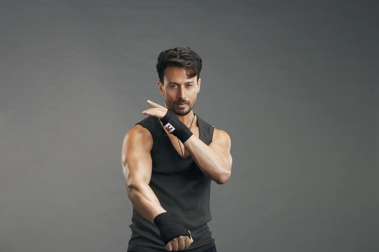 Tiger Shroff, co-founder of MMA Matrix Gym, in a martial arts guard with wrapped fists